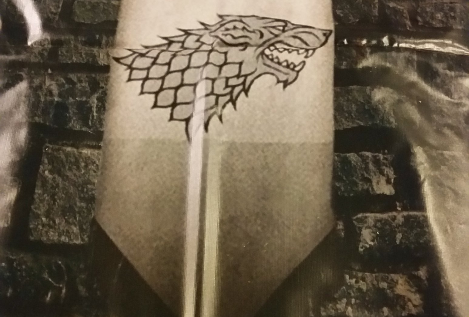 Stark banner wall covering